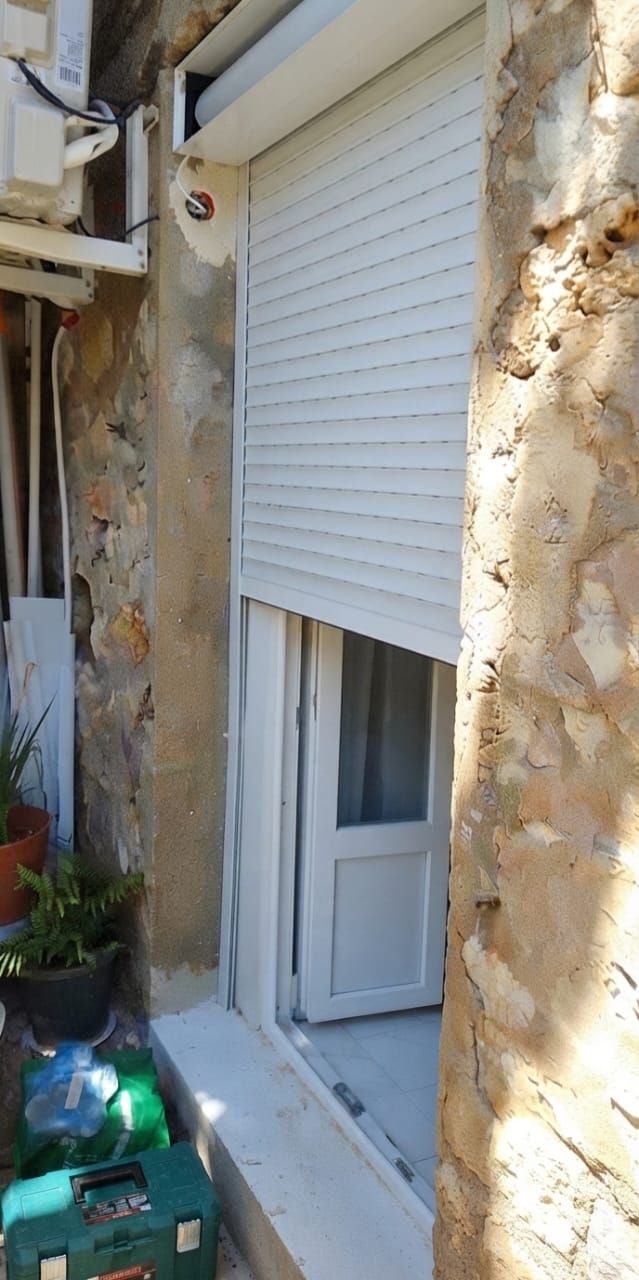 Volet roulant sur une porte-fenêtre